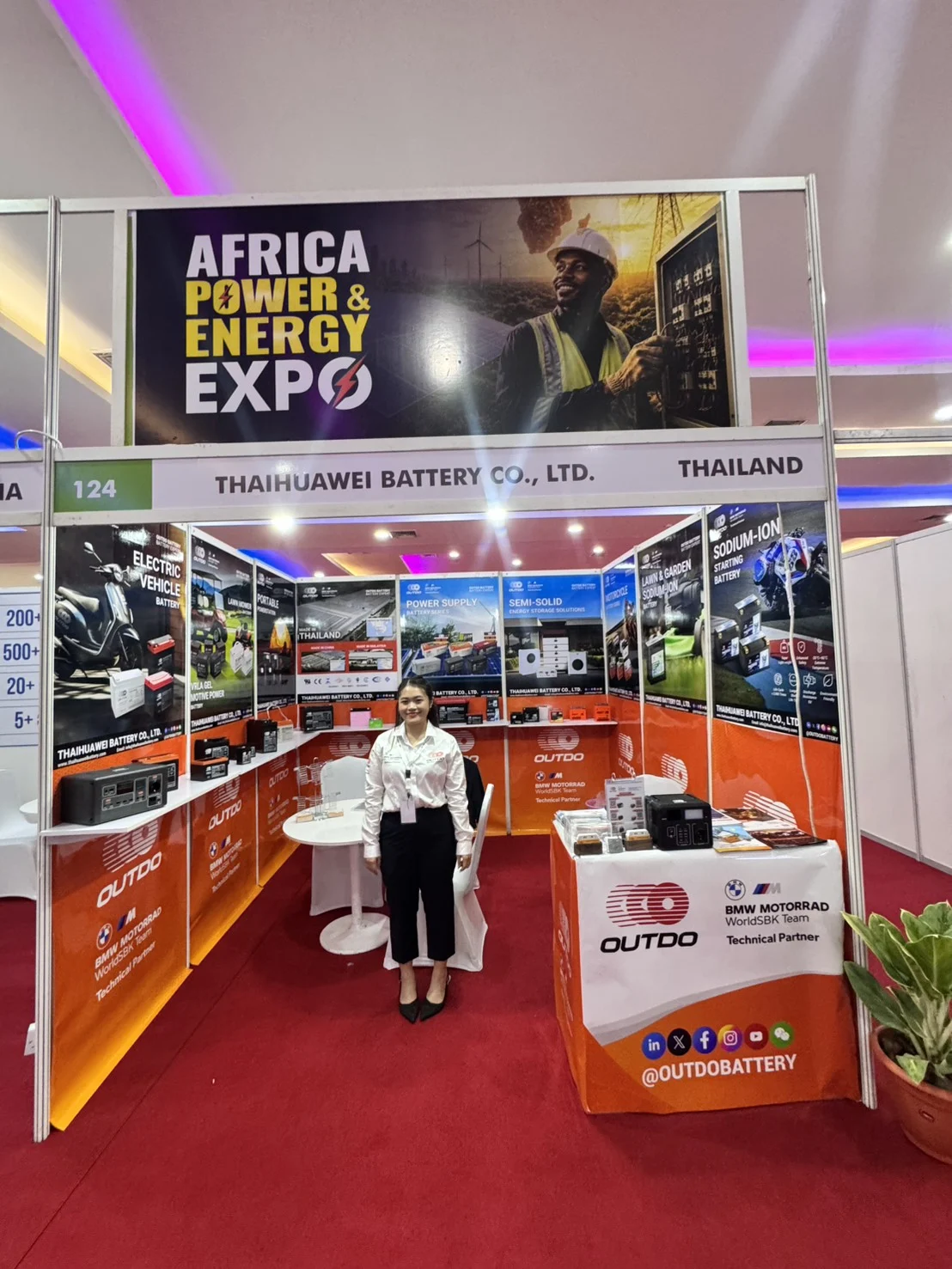 Thaihuawei Battery team member welcoming visitors at Booth 124, Power & Energy Tanzania 2026